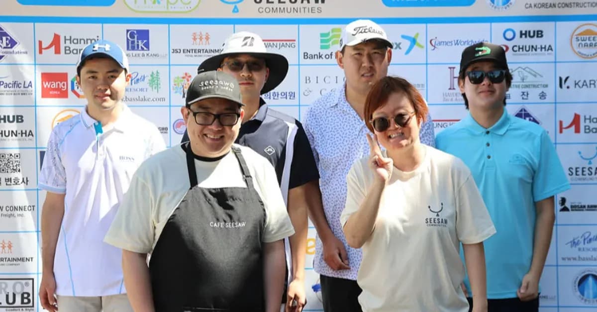 Seesaw Communities team and members gathered together at an event.